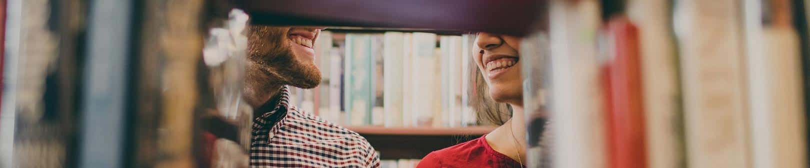 Couple in library smiling